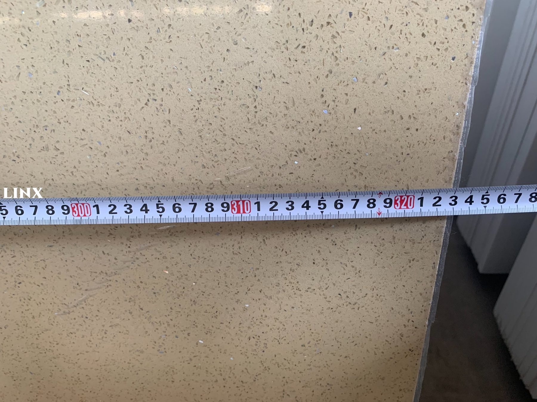 LX1202 SPARKLE BEIGE QUARTZ STONE CLOSE UP 1 LINX SURFACES