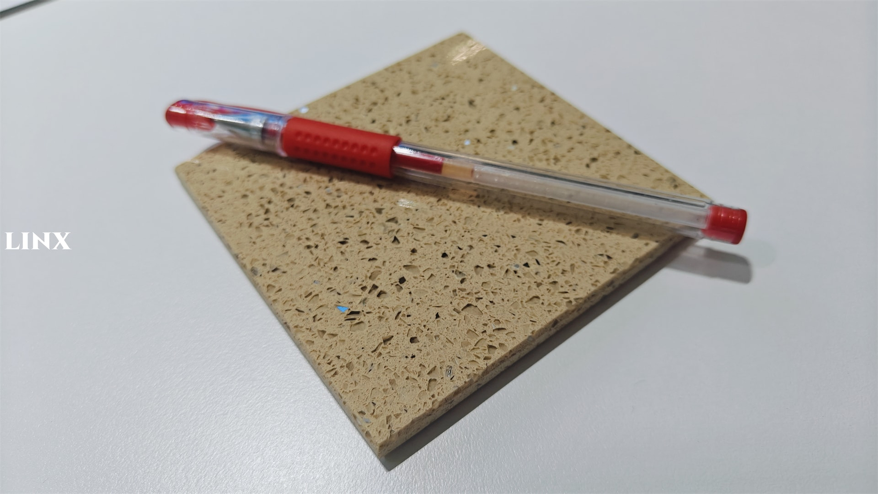 LX1202 SPARKLE BEIGE QUARTZ STONE SAMPLE CLOSE UP 2 - LINX SURFACES