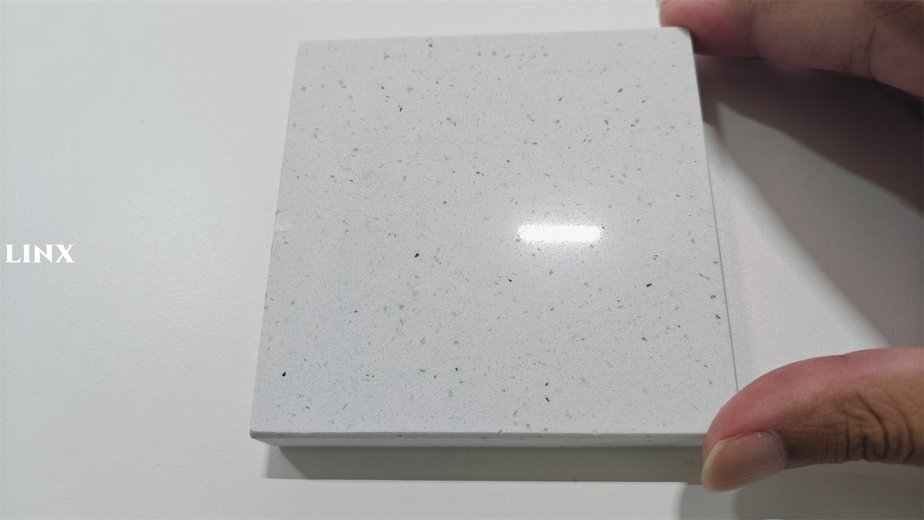 LX1314 SKY WHITE QUARTZ STONE SAMPLE CLOSE UP 1 - LINX SURFACES