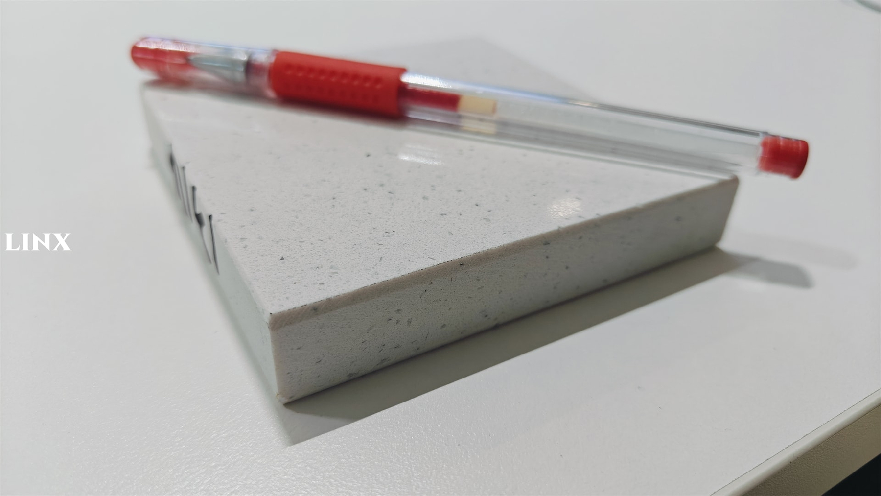 LX1314 SKY WHITE QUARTZ STONE SAMPLE CLOSE UP 2 - LINX SURFACES