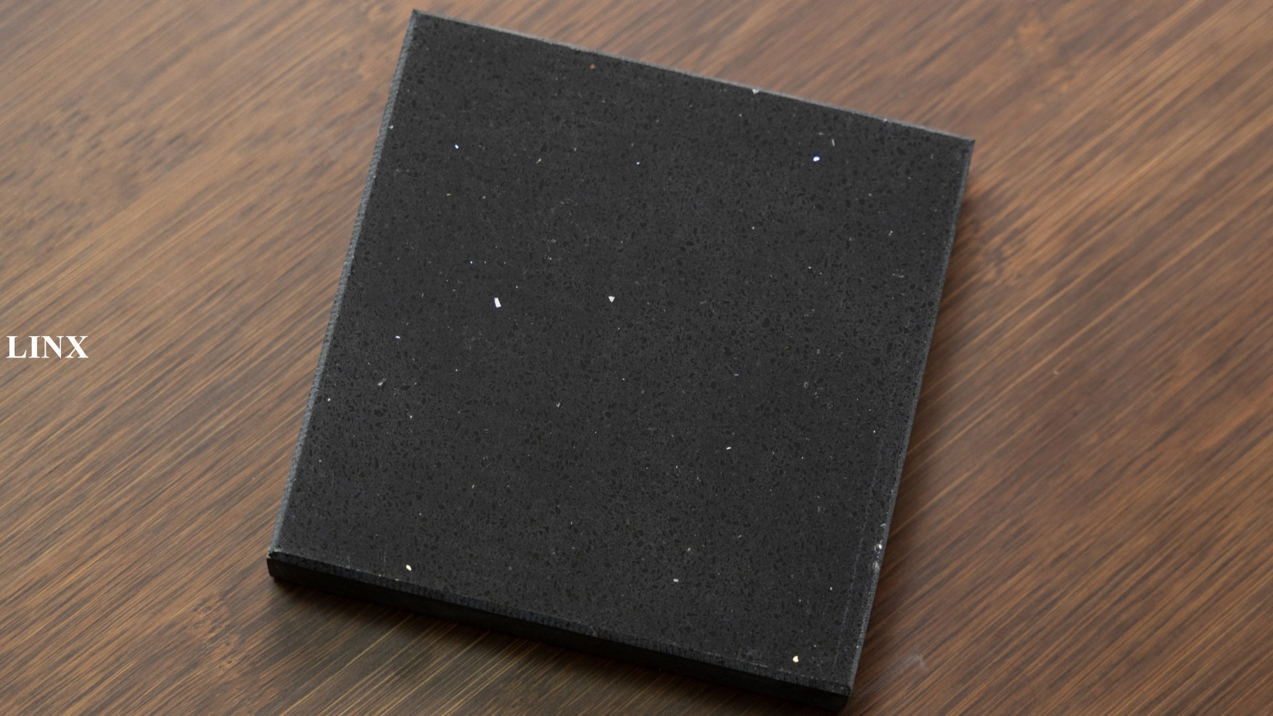 LX1315 SKY BLACK QUARTZ STONE SAMPLE CLOSE UP LINX SURFACES Sintered Stone