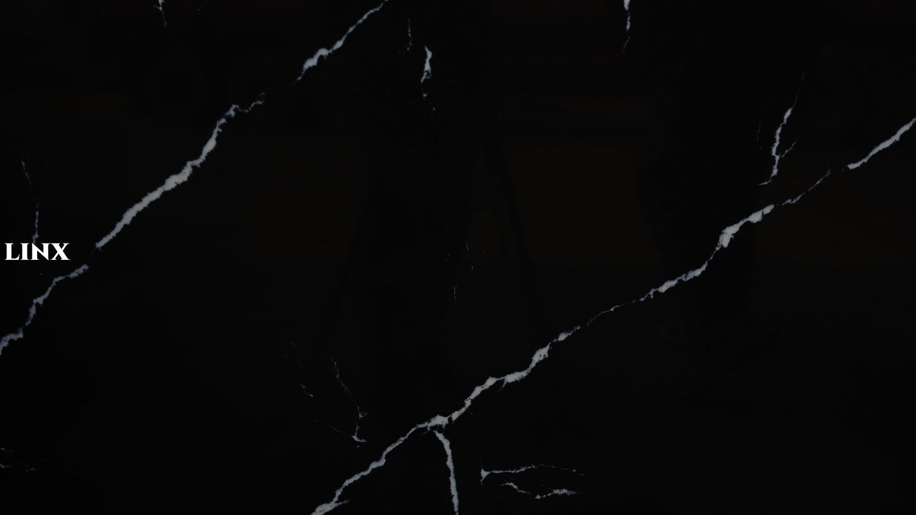 LX3042 CALACATTA BLACK QUARTZ STONE CLOSE UP 2 LINX SURFACES