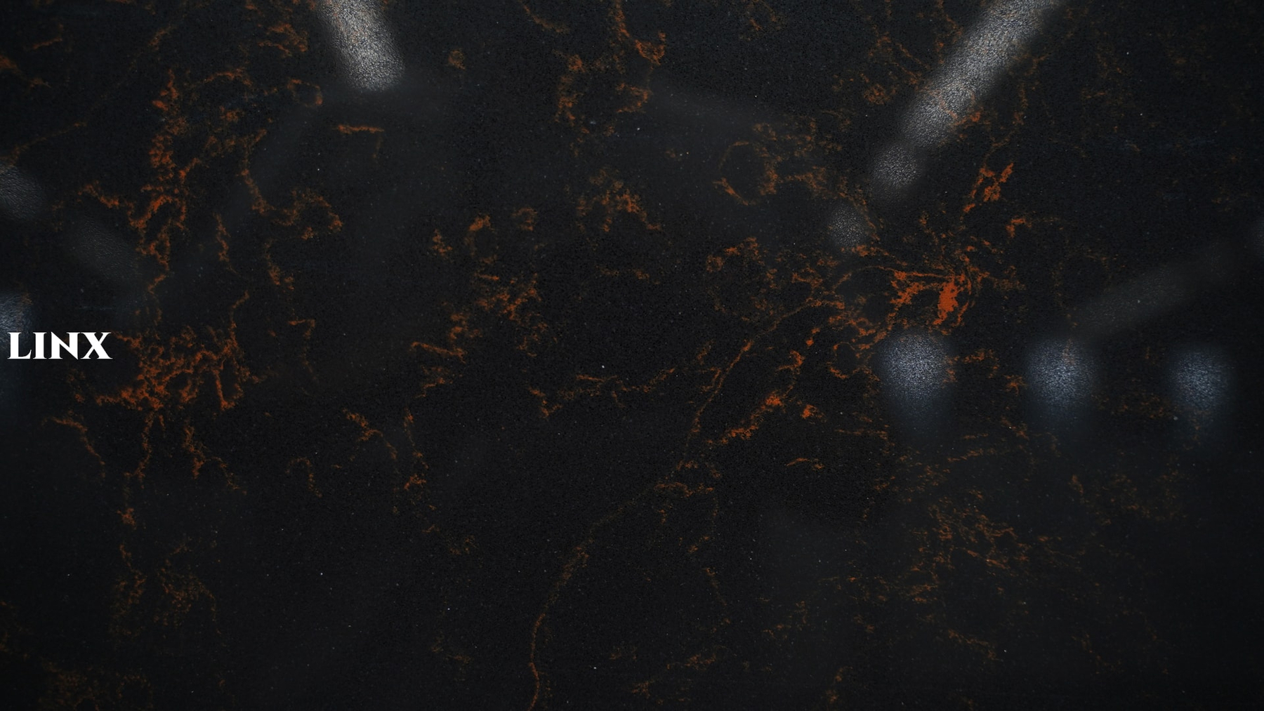 LX6814 CARRARA BLACK QUARTZ STONE CLOSE UP 2 LINX SURFACES