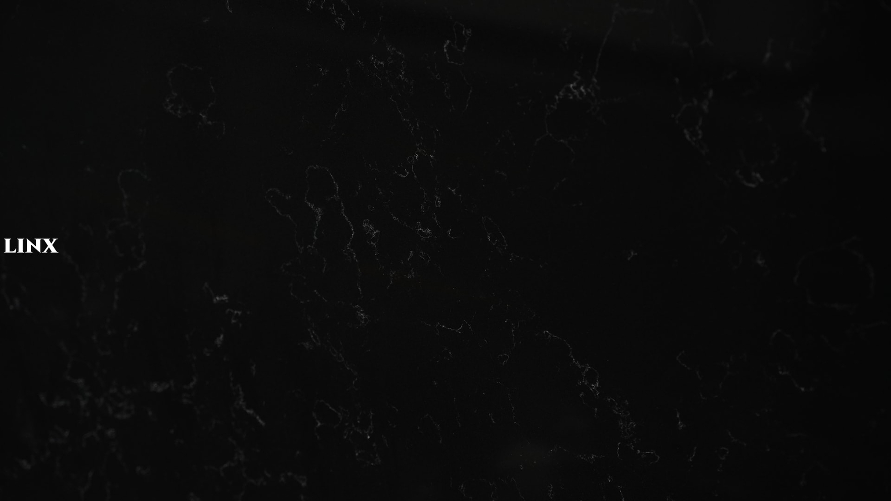 LX7200 CARRARA BLACK QUARTZ STONE CLOSE UP 2 LINX SURFACES