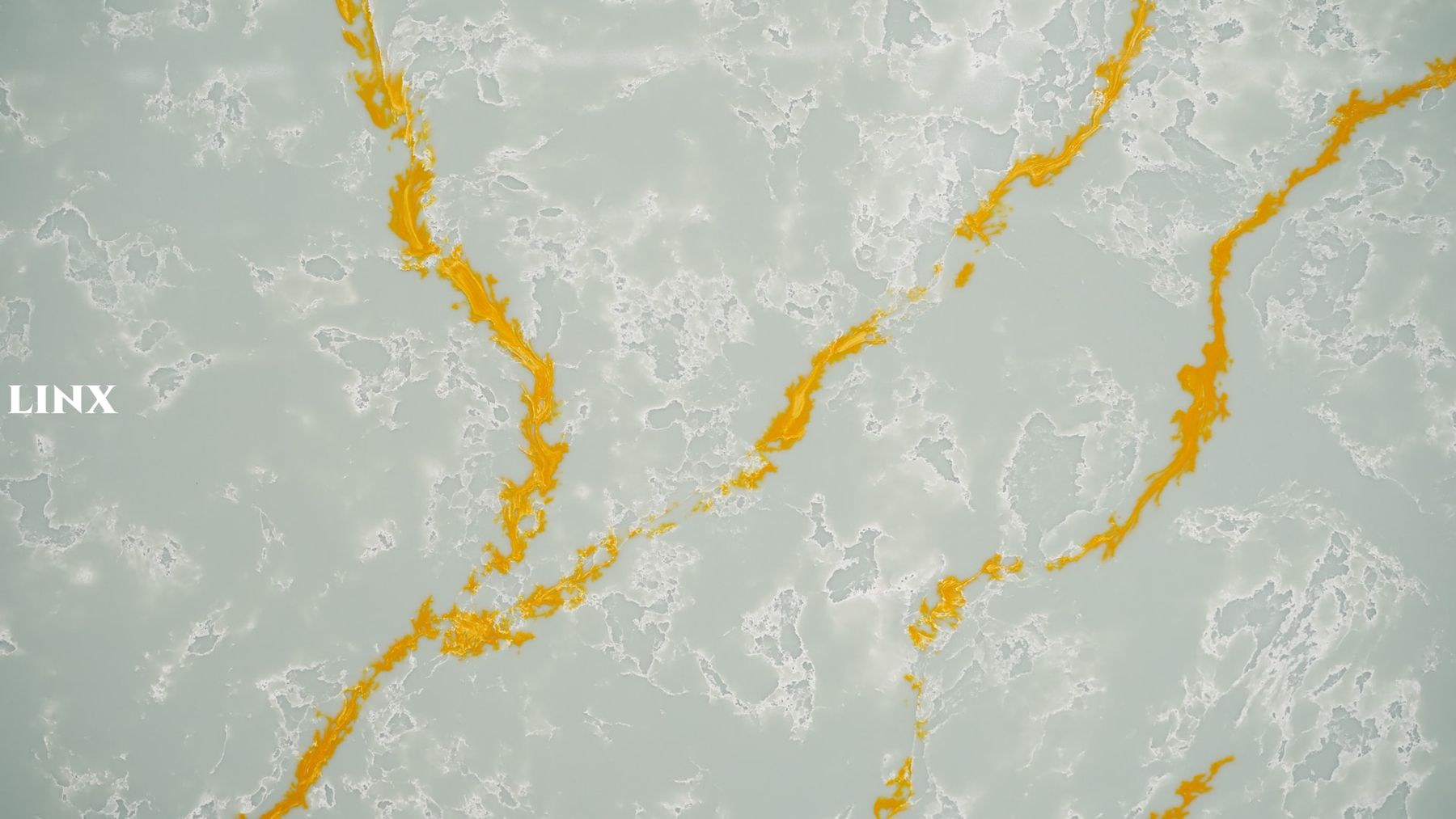 LX9012 ENAMEL GOLD QUARTZ STONE CLOSE UP 2 LINX SURFACES