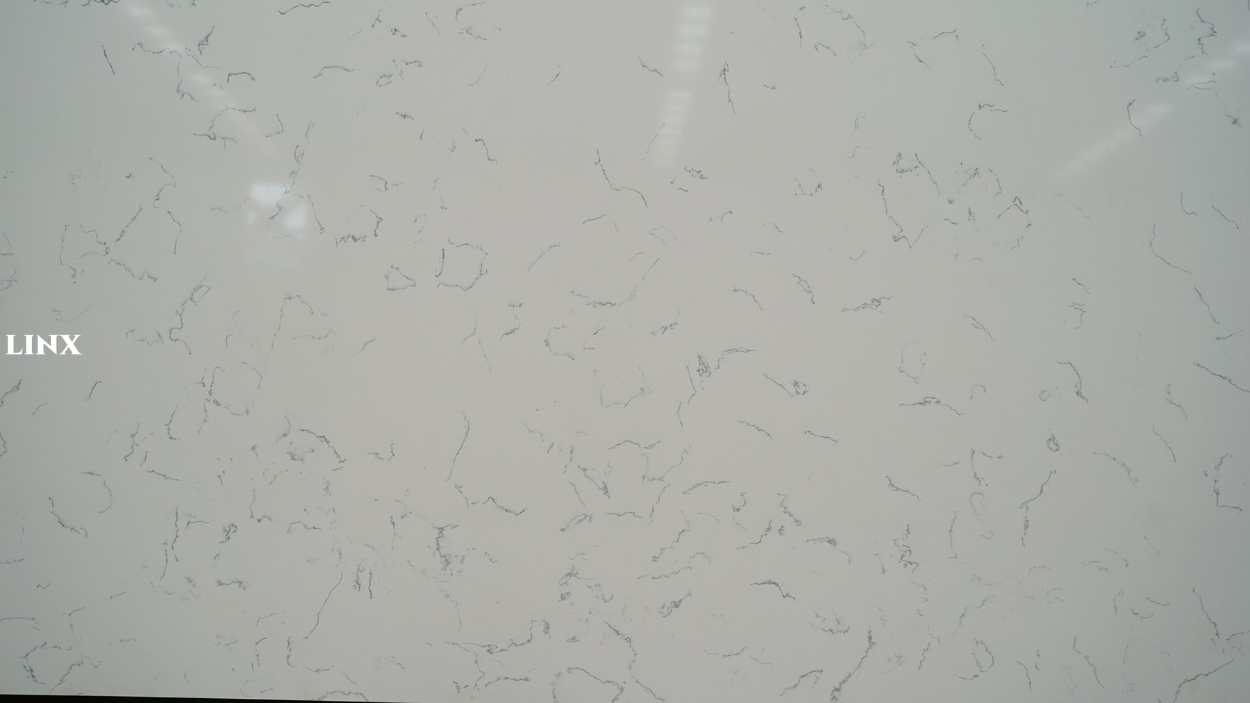 LXMIST CARRARA WHITE QUARTZ STONE CLOSE UP 1 LINX SURFACES