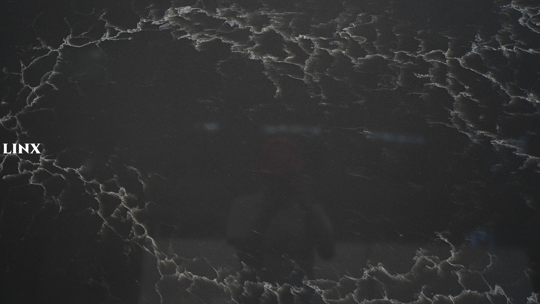 LX3206 CALACATTA BLACK QUARTZ STONE CLOSE UP 2 LINX SURFACES