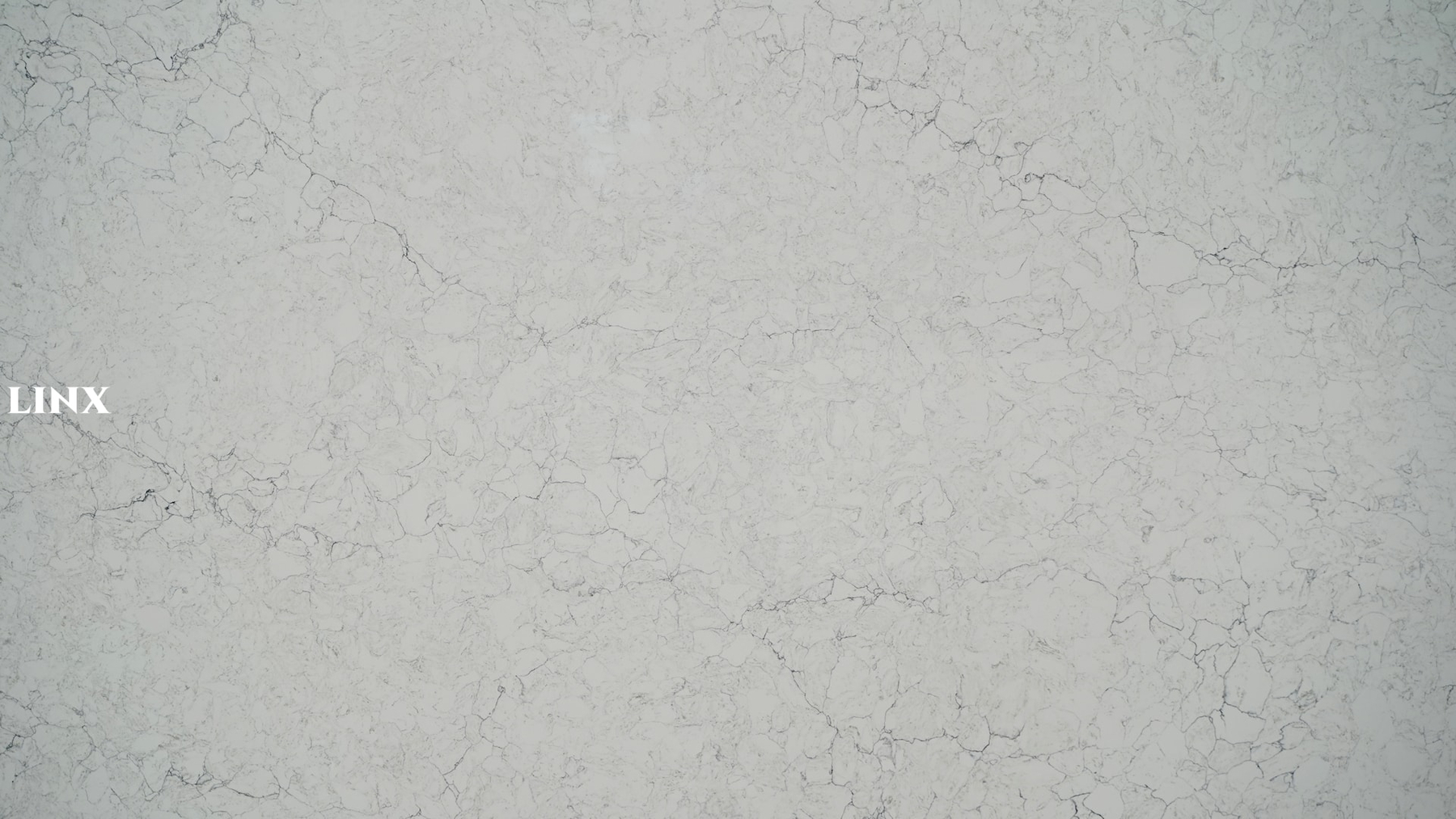 LX6895 GREYING CARRARA QUARTZ STONE CLOSE UP 1 LINX SURFACES