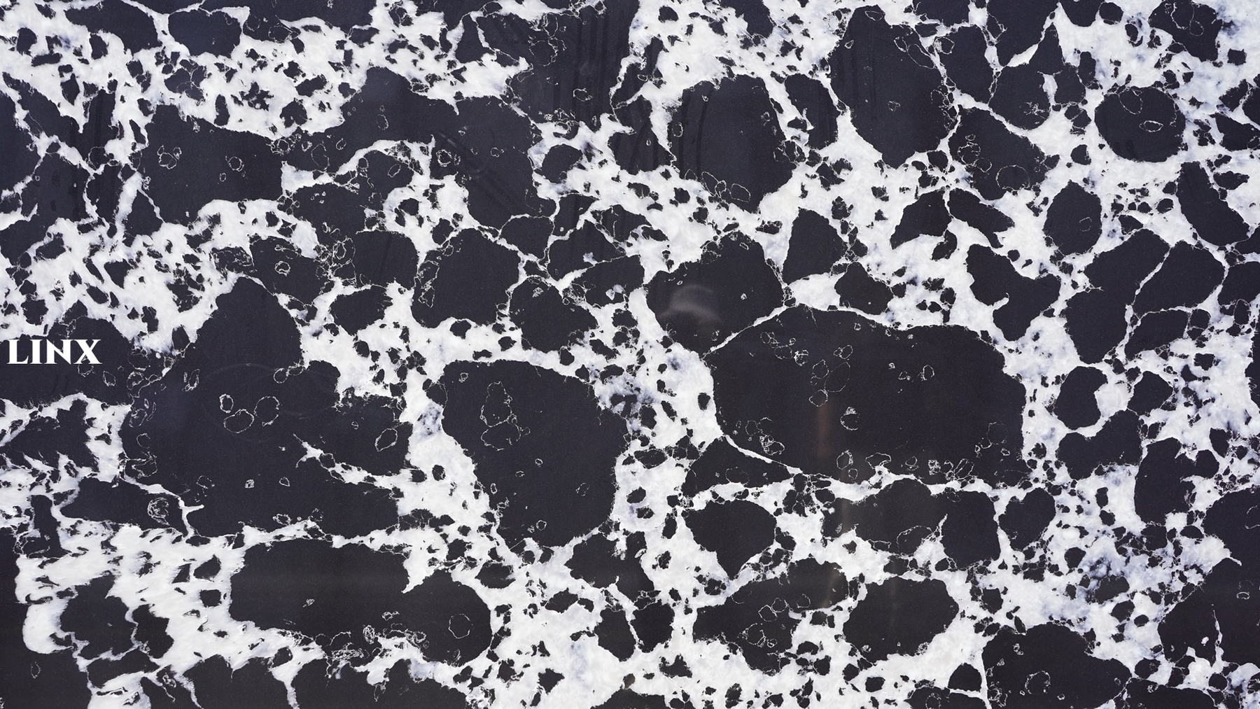 LXM9067 BLACK PUDDLE JADE STONE DETAIL 1 LINX SURFACES