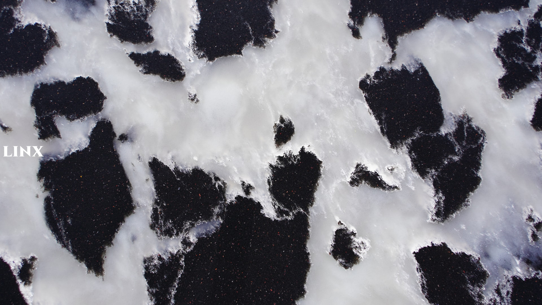 LXM9067 BLACK PUDDLE JADE STONE DETAIL 4 LINX SURFACES